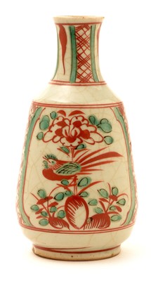 Lot 19 - A 19th Century Chinese glazed stoneware small vase or wine bottle.