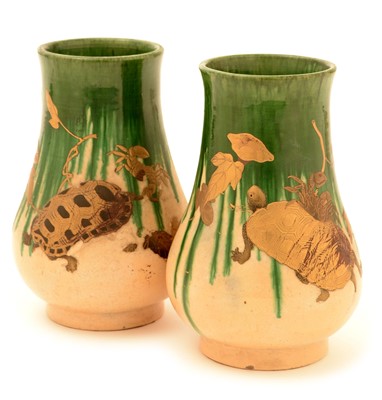 Lot 49 - An unusual pair of early 20th Century Japanese earthenware vases.