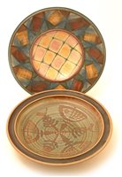 Lot 27 - Two studio pottery chargers.