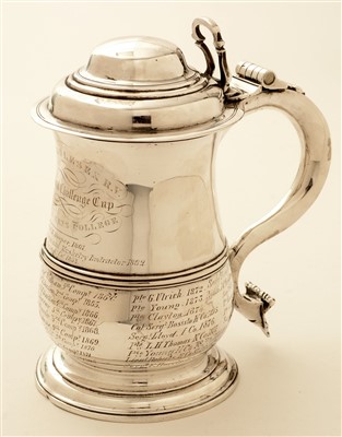 Lot 524 - George II silver lidded tankard