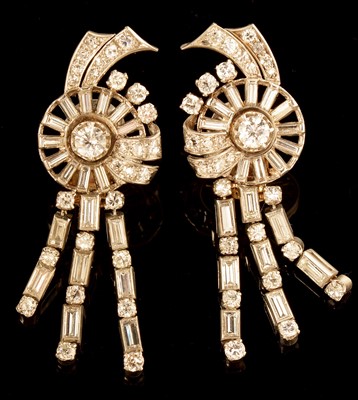 Lot 628 - A pair of diamond drop earrings