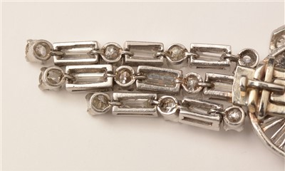 Lot 628 - A pair of diamond drop earrings