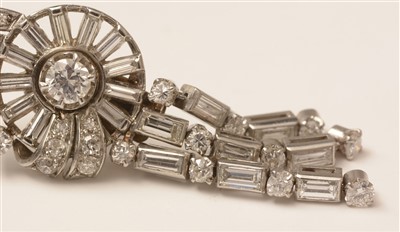 Lot 628 - A pair of diamond drop earrings
