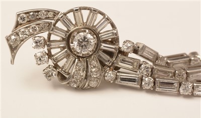 Lot 628 - A pair of diamond drop earrings