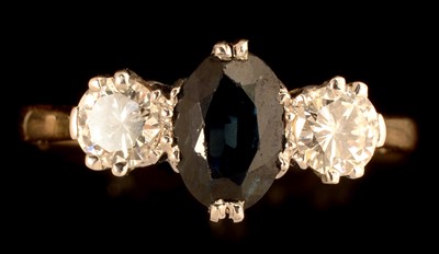 Lot 633 - Sapphire and diamond ring
