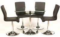 Lot 52 - A modern glass table ;land four chairs.