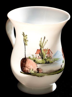 Lot 159 - An 18th Century Milchglas tankard.