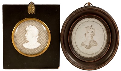 Lot 208 - Two portrait mirrors.