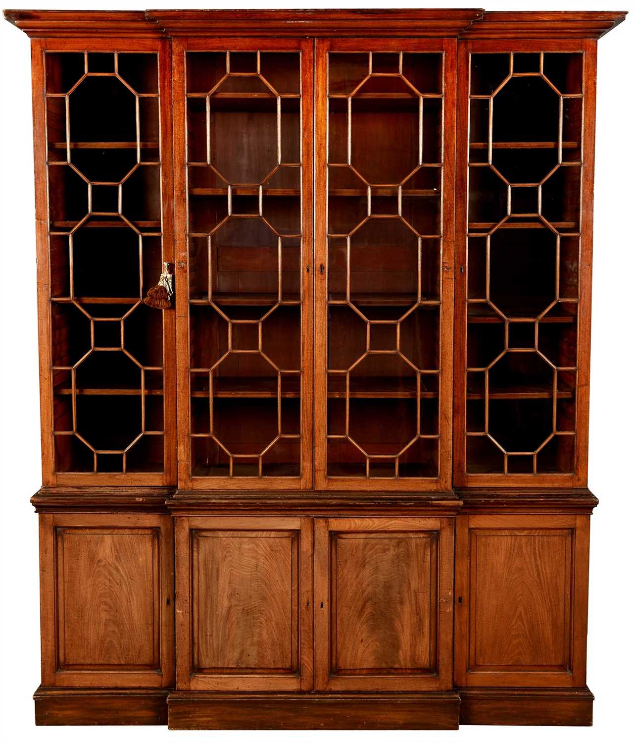Lot 773 - A 19th Century mahogany breakfront bookcase.