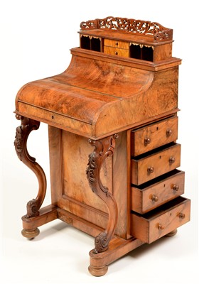 Lot 844 - A burr walnut Davenport.