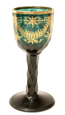 Lot 165 - A late 18th Century green faceted wine glass.