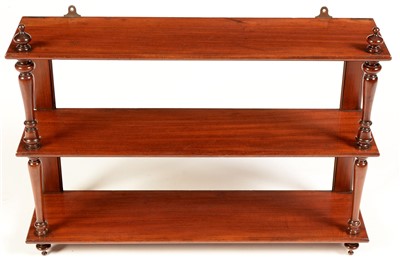 Lot 778 - A three-tier mahogany wall bracket.