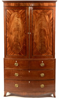 Lot 780 - A George IV mahogany bowfront press.