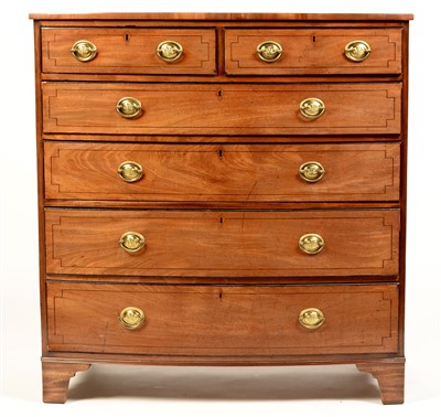 Lot 783 - A George III mahogany bowfront chest.