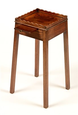Lot 786 - A mahogany urn stand.