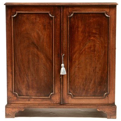 Lot 787 - A George III mahogany cupboard.