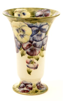 Lot 130 - William Moorcroft for Macintyre: a 'Pansy' pattern trumpet-shaped vase.