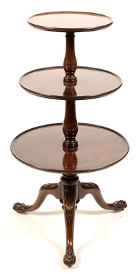 Lot 823 - A mahogany three-tier dumb waiter.