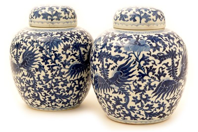 Lot 359 - A pair of late 19th Century Chinese blue and white porcelain ginger jars and covers.