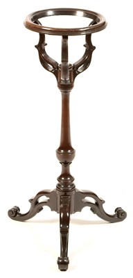 Lot 759 - A mahogany basin stand.