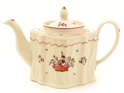 Lot 113 - A Newhall silver or commode shaped teapot.