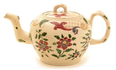 Lot 118 - A Staffordshire salt glazed stoneware teapot.