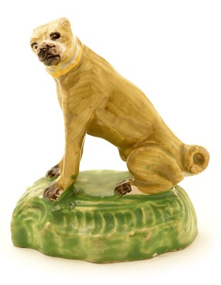 Lot 93 - An early 19th Century Staffordshire Pearlware figure of a pug.