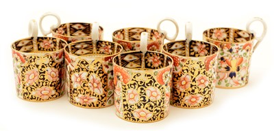 Lot 99 - A set of seven Bloor Derby Imari pattern coffee cans.