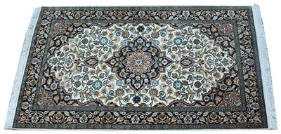 Lot 535 - Silk Kashmieri rug, with central medallion and...
