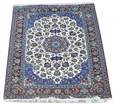 Lot 667 - Part silk Tabriz rug