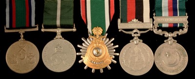 Lot 1851 - Four Pakistan medals and a Saudi Arabia medal