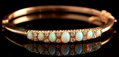Lot 76 - Opal and diamond bangle