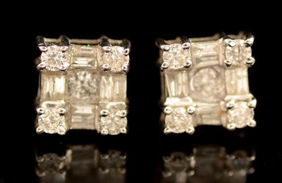 Lot 154 - A pair of diamond stud earrings