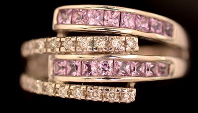 Lot 175 - Pink sapphire and diamond ring