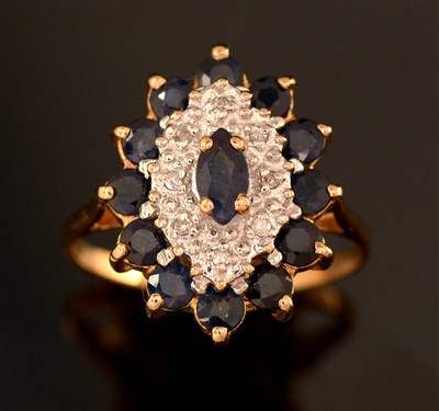 Lot 166 - Sapphire and diamond cluster ring