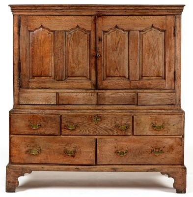 Lot 807 - An oak press cupboard.