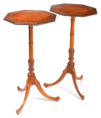 Lot 804 - A pair of Georgian tripod tables.