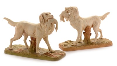 Lot 609 - Two similar Royal Dux figures of setters