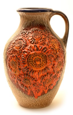 Lot 1535 - A German slip cast large ovoid ewer.