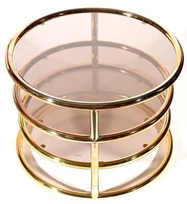 Lot 1562A - A three-tier brass coffee table.