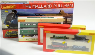 Lot 1385 - Hornby train set; railcar set; and two goods train sets.
