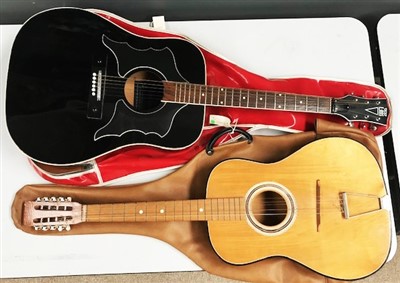 Lot 134A - Eros 606 Raven guitar and another.