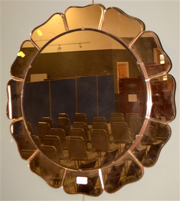 Lot 933 - A 1950's pink tinted floral circular wall mirror.