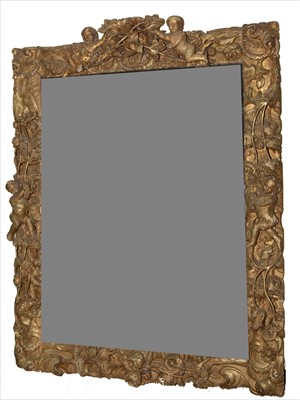 Lot 1034 - A Baroque style giltwood wall mirror