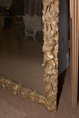 Lot 1034 - A Baroque style giltwood wall mirror