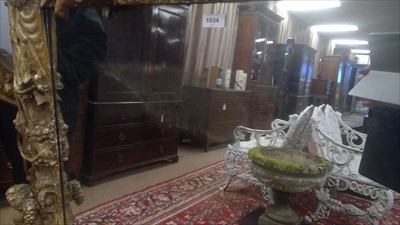 Lot 1034 - A Baroque style giltwood wall mirror