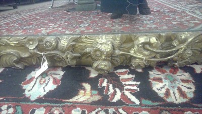 Lot 1034 - A Baroque style giltwood wall mirror