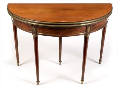 Lot 1004 - A Directoire mahogany and brass mounted games table