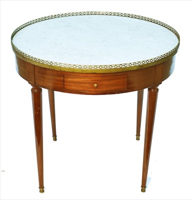 Lot 1007 - A French Directoire mahogany table bouillotte