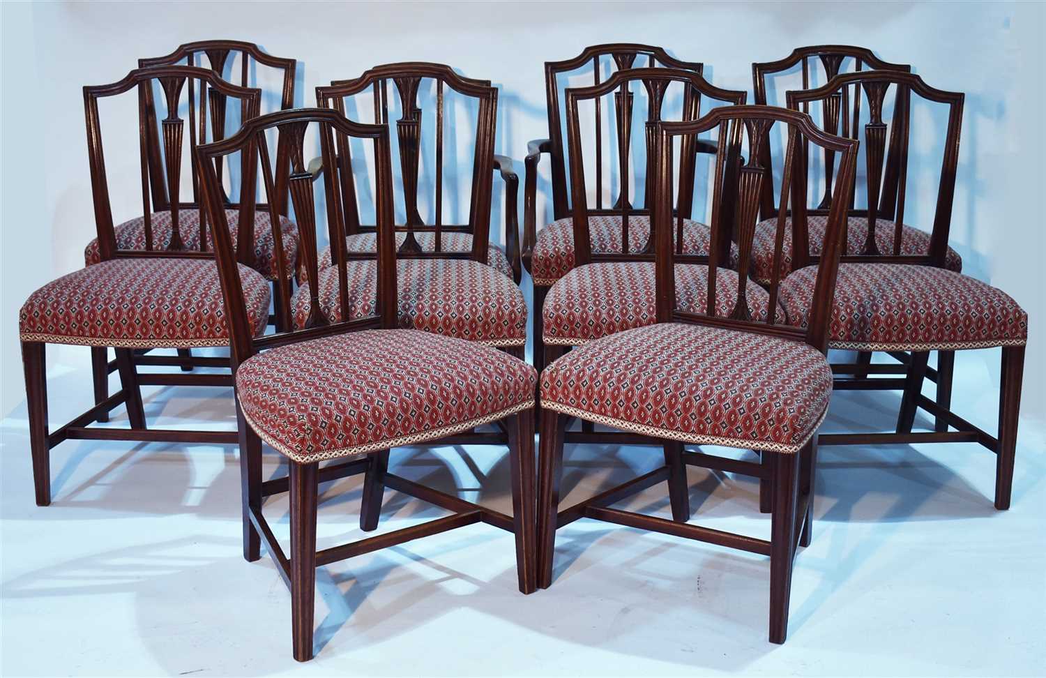 Lot 1185 - A set of ten George III and later mahogany dining chairs.